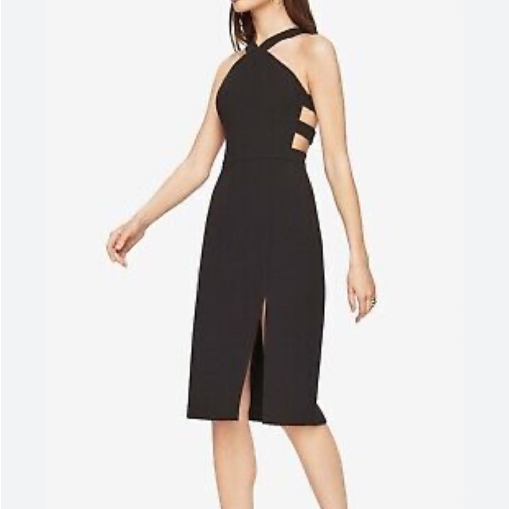 Black crepe 3/4 length dress with side cutouts.